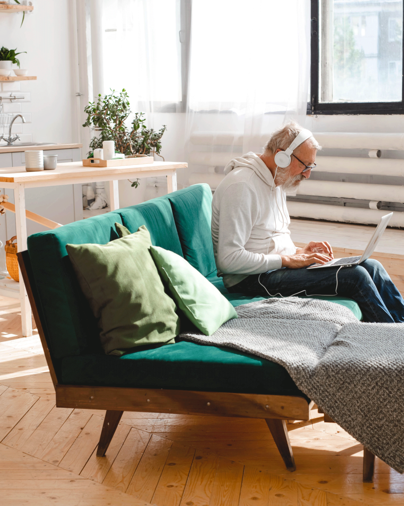 senior-elderly-hipster-man-using-phone-while-liste-2023-11-27-05-10-08-utc